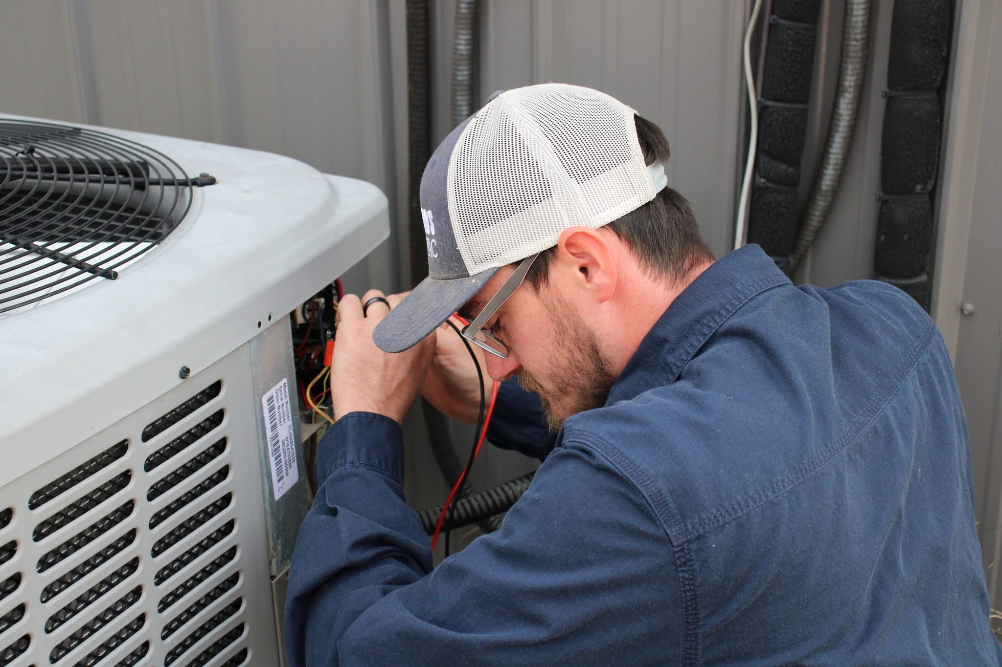 2 Lakes HVAC technician at work